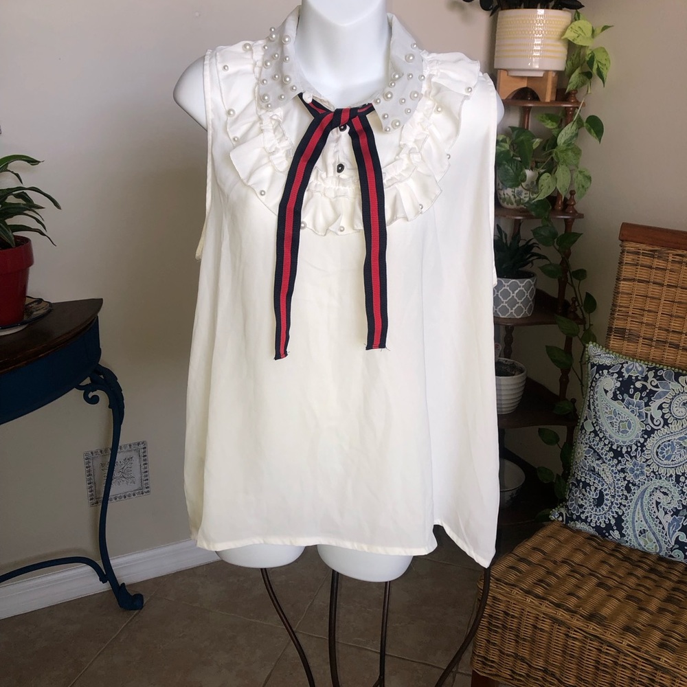 Elegant White Sleeveless Blouse with Pearl Accents